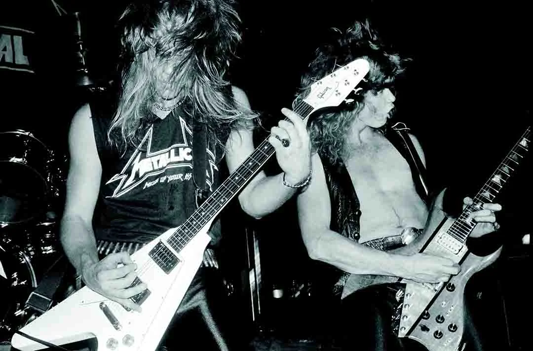 James Hetfield and Dave Mustaine of METALLICA in 1983, photo by Brian Lew from MURDER IN THE FRONT ROW